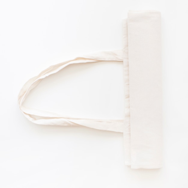 Cotton white hand bag with handle on white background