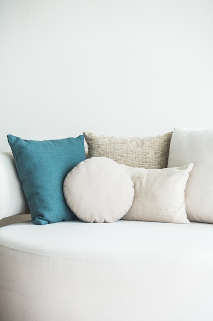 Couch with cushions and a blue