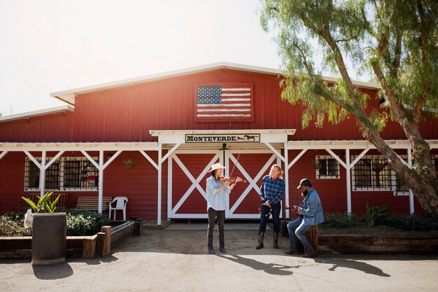 Country music band singing outdoors