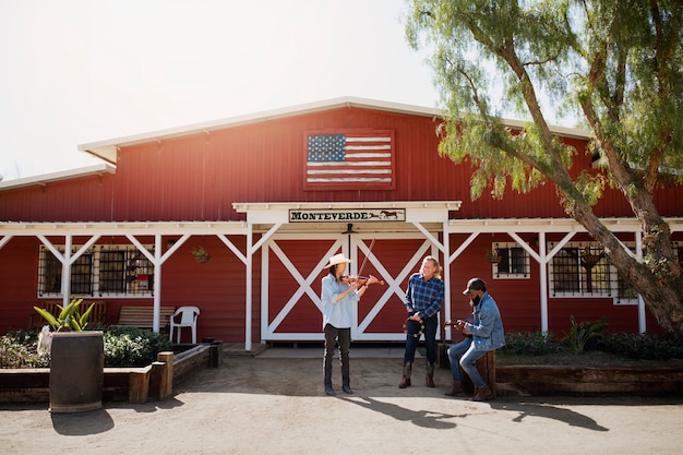 Country music band singing outdoors