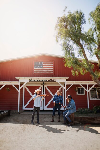 Country music band singing outdoors