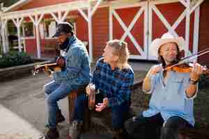 Free photo country music band singing outdoors