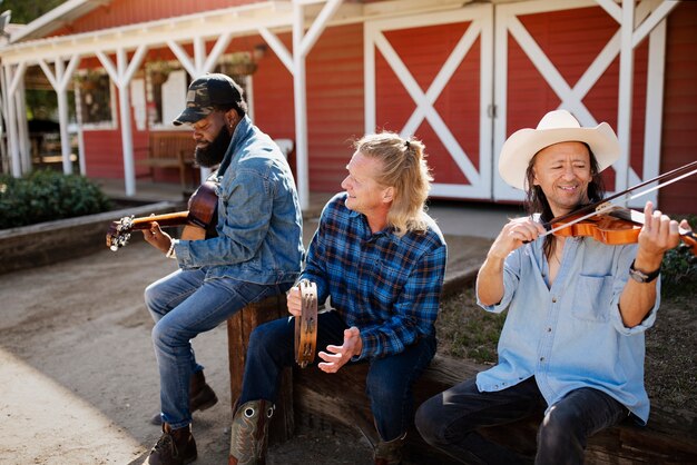 Country music band singing outdoors