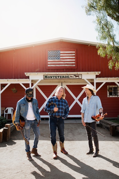 Country music band singing outdoors