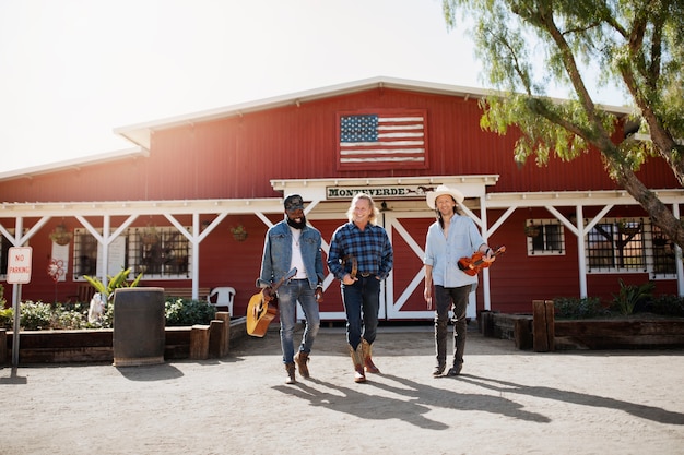 Country music band singing outdoors