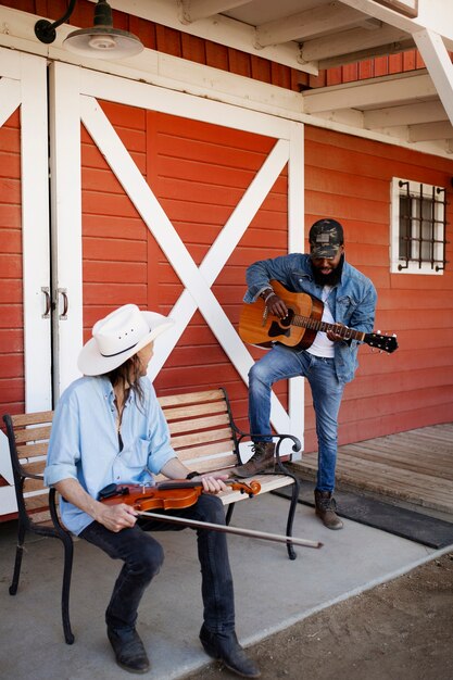 Country music band singing outdoors