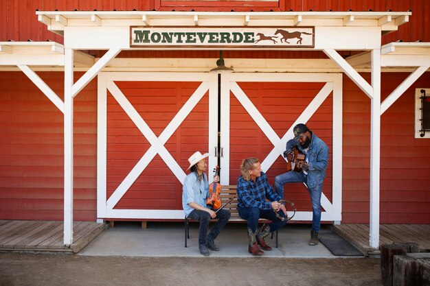 Country music band singing outdoors