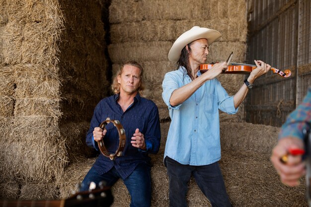 Country music band singing outdoors