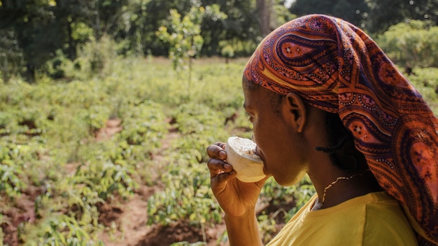 Countryside worker enjoying a fruit