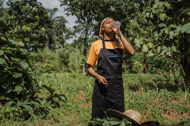 Countryside worker having some water