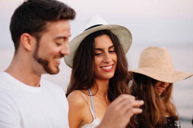 Free photo couple at beach party