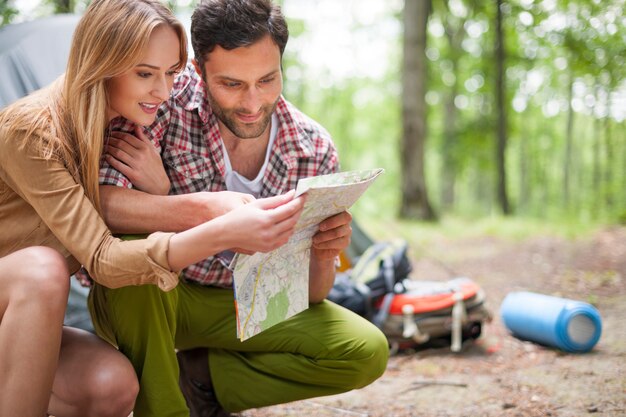 Couple camping in the forest