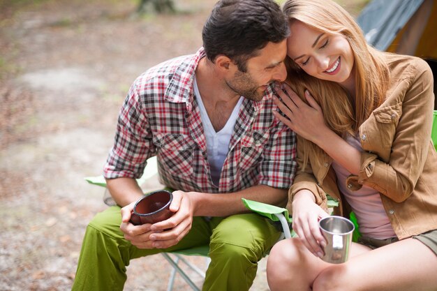 Couple camping in the forest