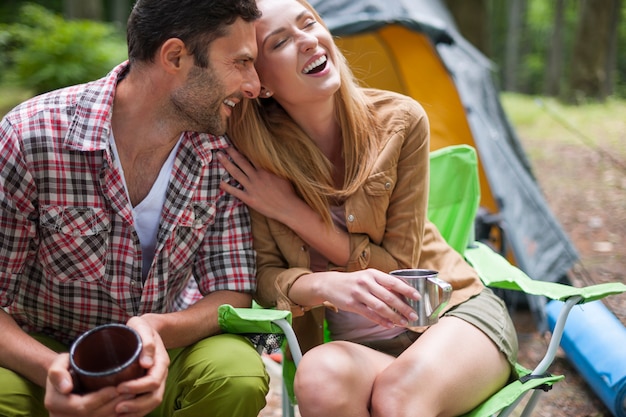 Couple camping in the forest