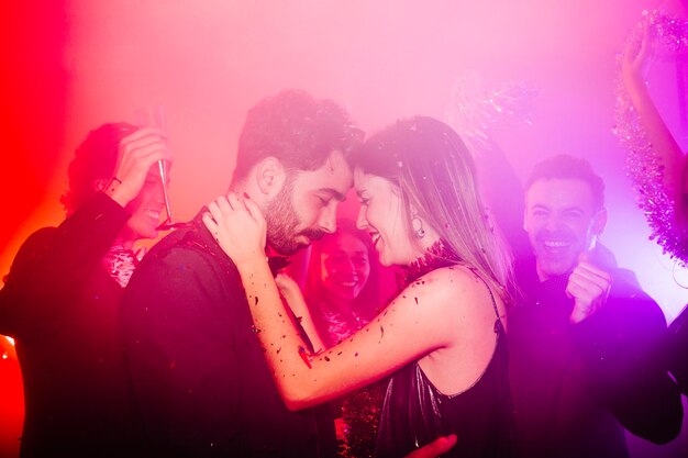 Couple celebrating new year in club