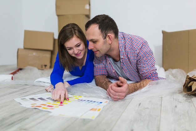 Couple choosing color for interior decoration