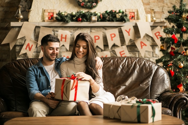 Couple on Christmas with presents