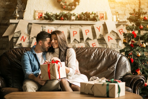 Couple on Christmas with presents