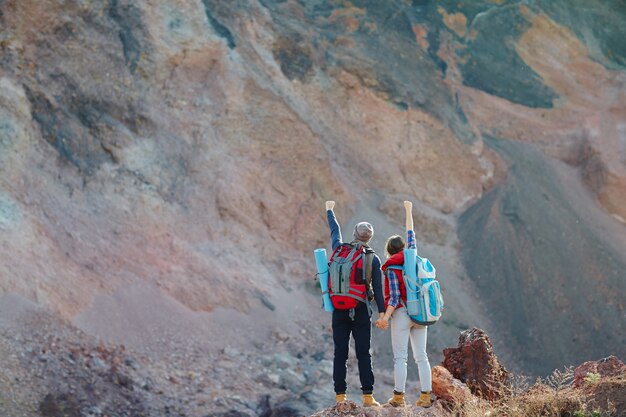 Couple Conquering Mountains Together