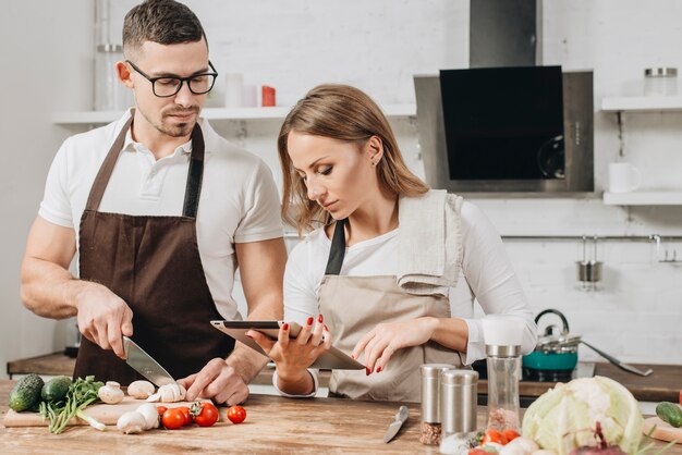 Couple cooking at home