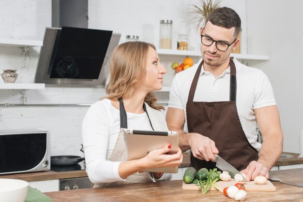 Couple cooking at home