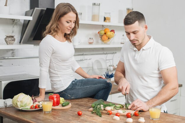 Couple cooking at home