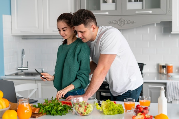 Couple cooking at home