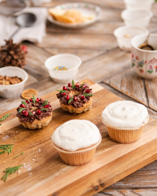 Free photo couple of cupcakes with simple icing