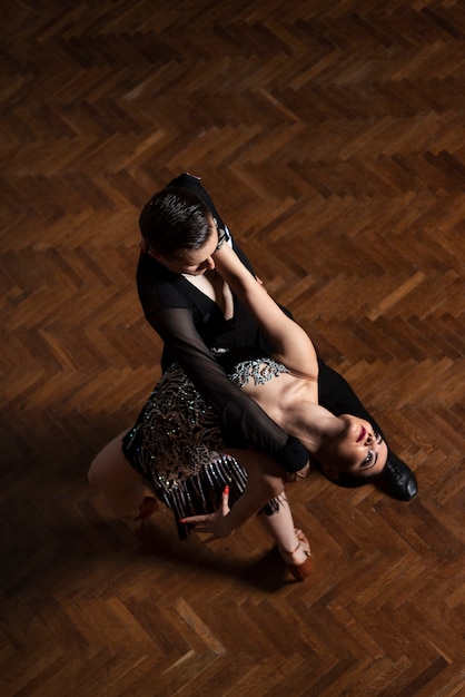 Couple dancing in ballroom dance