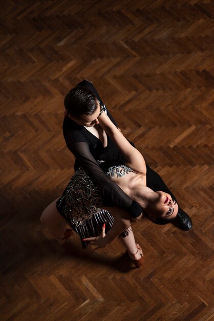 Couple dancing in ballroom dance