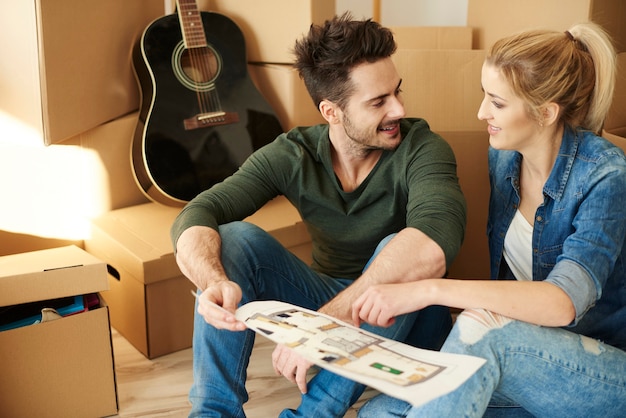 Couple deciding where to put the rest of things