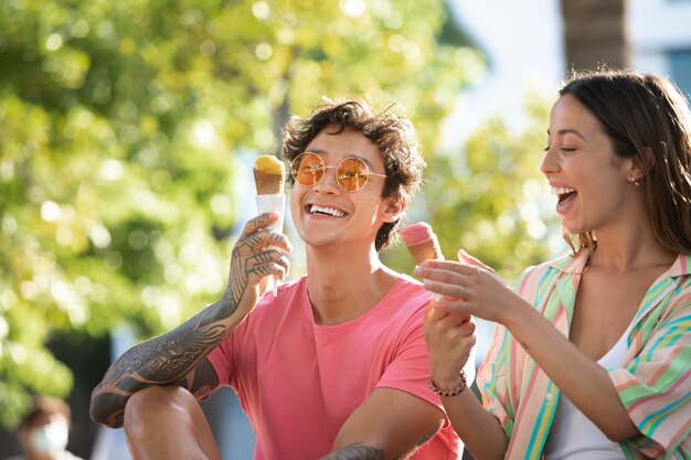 Couple eating ice cream while traveling