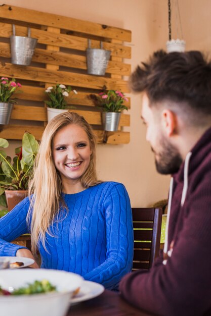 Couple eating outside on date