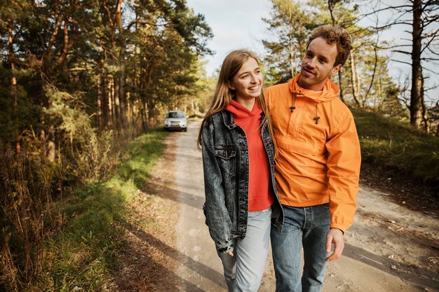 Couple embraced outdoors on a road trip