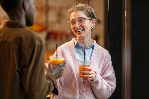 Couple enjoying drinks in restaurant