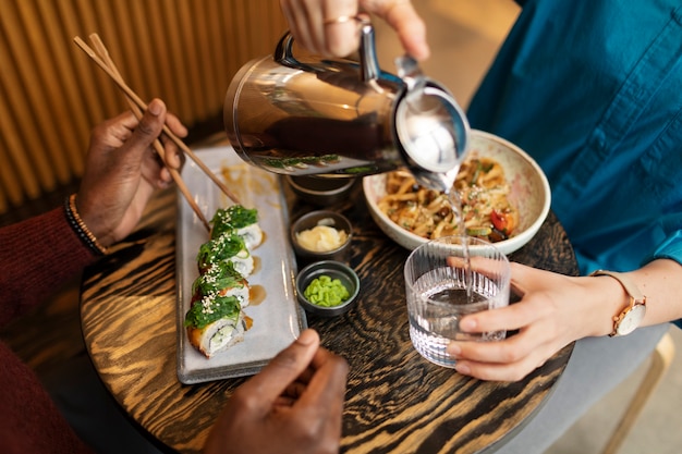 Couple enjoying food in restaurant