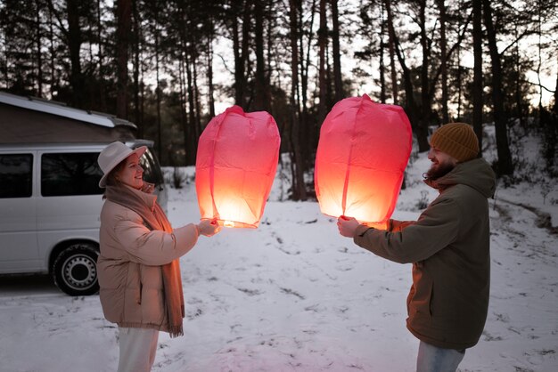 Couple enjoying their winter camp