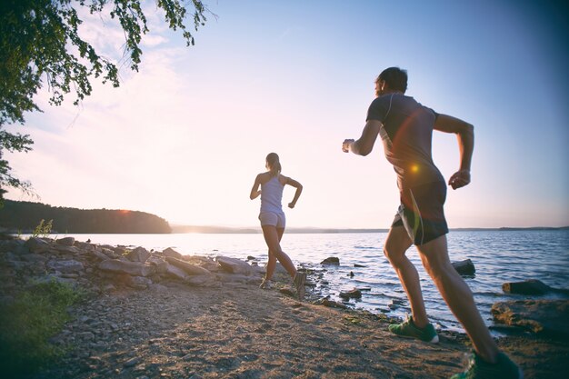 Couple exercising on holiday