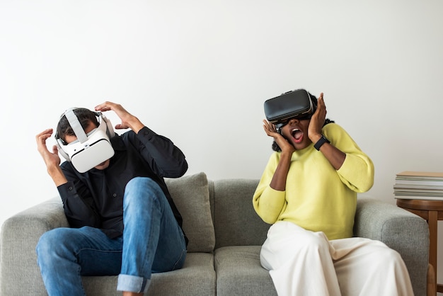 Free photo couple experiencing vr simulation entertainment technology