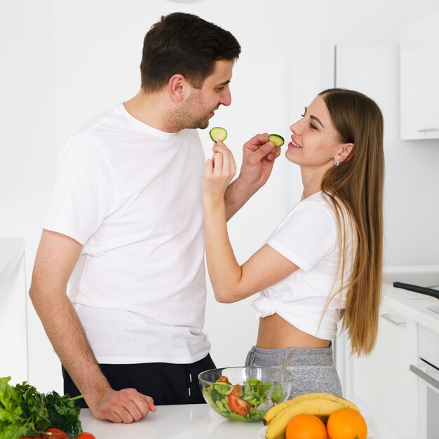 Couple feeding each other