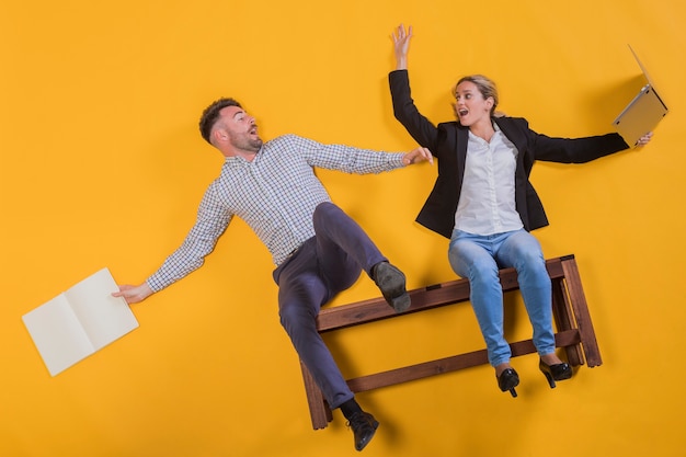 Couple floating on a bench