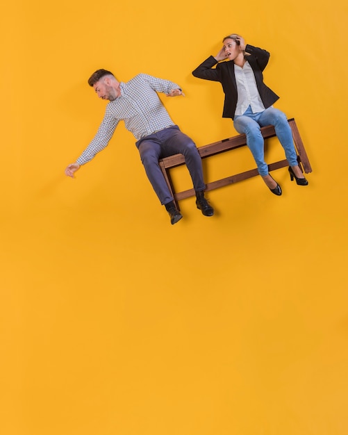 Couple floating on a bench