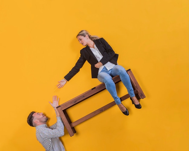 Couple floating on a bench