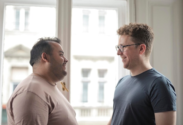 couple of friends discusses cheerful at home