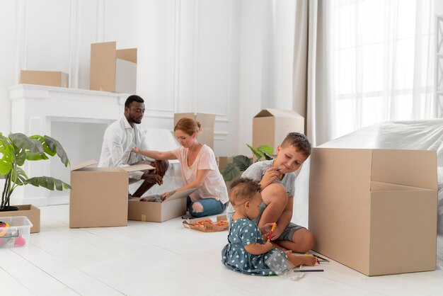 Couple getting ready to move with their children