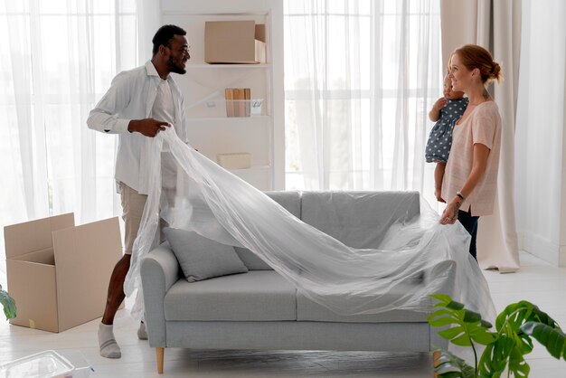 Couple getting ready to move with their daughter