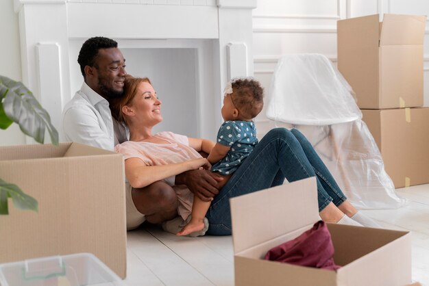 Couple getting ready to move with their daughter