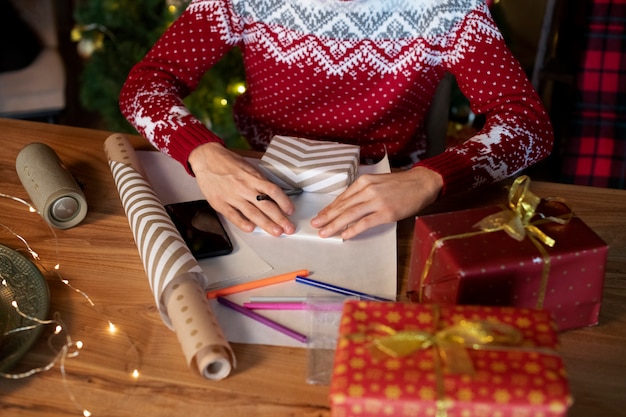 Couple giving each other christmas gifts