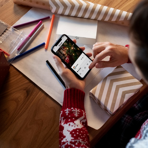 Couple giving each other christmas gifts