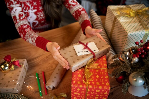 Couple giving each other christmas gifts